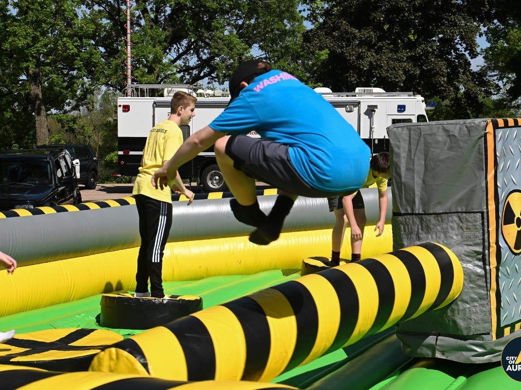 A student competes in the 31st annual Sports Festival in 2025 in Aurora.