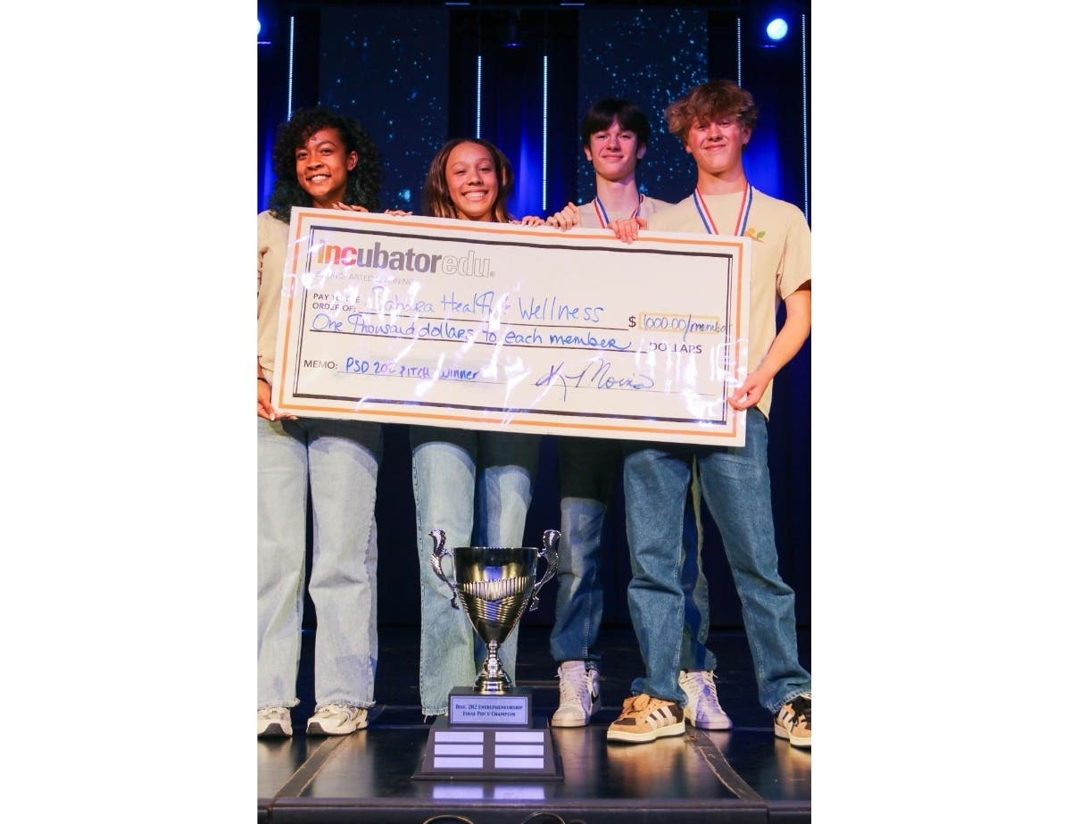 Team Sahara Health and Wellness — consisting of (from left) seniors Michelle Haley and Asia Sudberry and juniors Rowan Paul and James Atwood — earned first place at the second annual District 202 Entrepreneurial Student Final Pitch Night  May 5.
