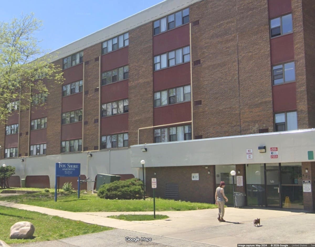 The owners of Fox Shore Apartments in downtown Aurora, along with a construction company, were sued by the state for alleged improper asbestos cleanup.