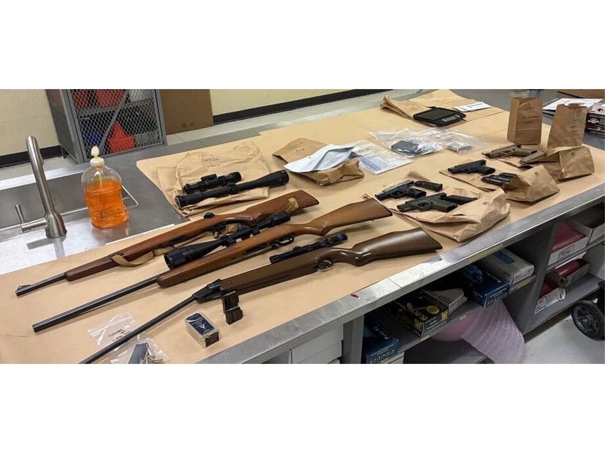 Investigators recovered three rifles, four handguns and more than 100 rounds of ammunition while executing a search warrant Sept. 1 at a residence in the 500 block of Sherman Avenue, Aurora police said.