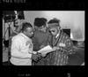 Dave Trugoy the Dove. Member of De La Soul (R.I.P.). Going Over the Set Shots with Director Phil Mailard, Captured on the Set of “My Buddy” Music Video. Photo Shoot for Historical Documentation 1989, New York City. 35mm Black and White Film. 