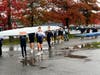 Summit sophomores Will Gawronski and Sami Feteiha carry their 8-man boat to the dock in preparation for racing at the Head of the Fish regatta