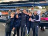 Summit middle schoolers Eamon McConnon, Drew Tomassi, Griff Sanborn, Jimmy Weir and Caroline Barbato pose for a photo after completing the Head of the Fish regatta