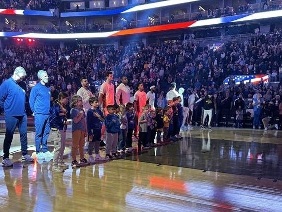 During a recent outing, local youth were invited onto the court during the national anthem at a recent Warriors basketball game.