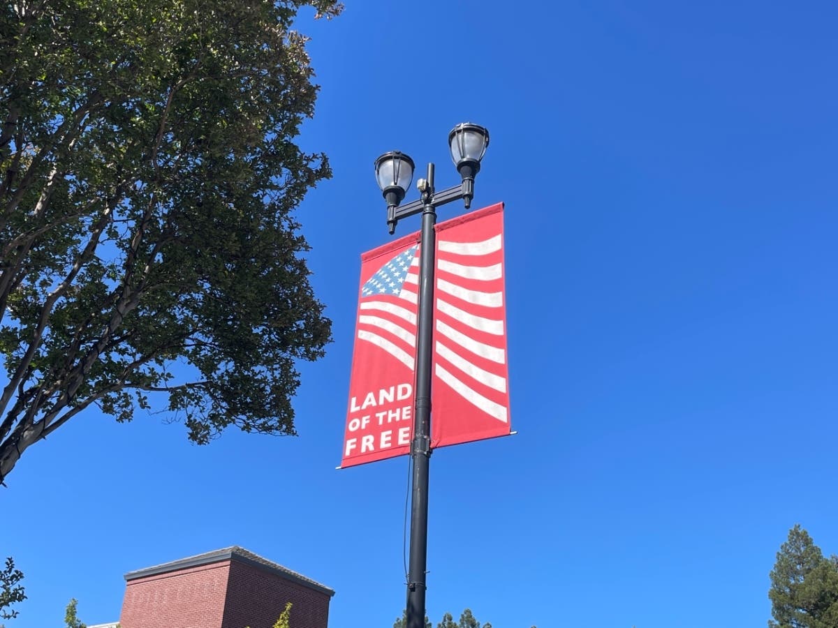 "Land of the Free" street banner