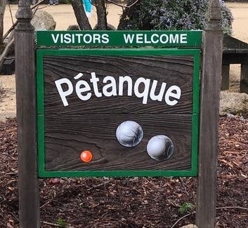 Wooden sign at the Petanque Fields in Lafayette CA