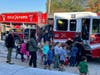 Southwest Greensburg volunteer firefighters interact with students of Amos K. Hutchinson Elementary School on Oct. 7.