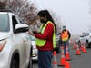 Lines formed in the parking lot at the Yolo County Office of Education for a vaccine clinic held in Woodland.