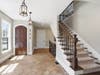 Elegant staircase offering a strong architectural focal point and seamless flow throughout the home.