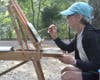 Artist Celeste Fondaco painting "En Plein Aire".