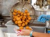 Loukoumades -- hot deep fried dough balls soaked in honey and dusted with sugar and cinnamon -- are a festival favorite.