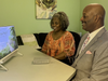 Taurus and Leah Paul, of Indianapolis, use resources from jw.org to preview the “Pursue Peace” Convention.