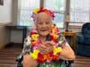 Janet Morikawa, a native of Hawaii, celebrates her 99th birthday with friends at Chelsea Place, an Anthem Memory Care community.