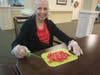 Porter Place resident Joan Kauck plans to share garden fresh bruschetta with her friends at the community. 