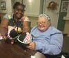 Porter Place life engagement assistant Kimeshia Randle and resident Mary Lee put their creativity to work on bras for a cause.