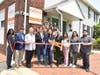 Town of Hempstead Clerk Kate Murray (third l) and Lynbrook Village Trustee Robert Boccio (second l) join Doctors and staff in cutting the ribbon for the new Allied office in Lynbrook.
