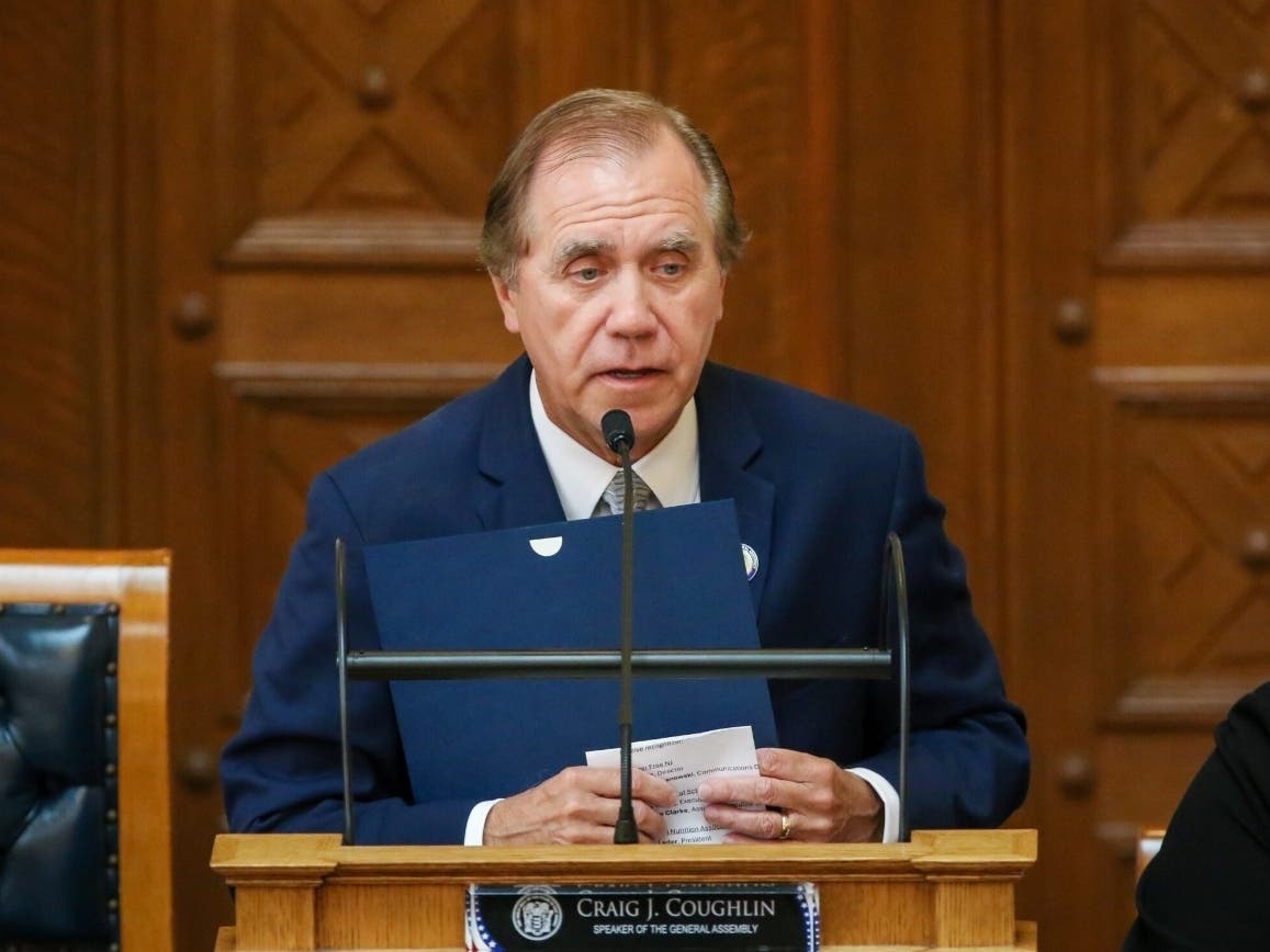 A former paralegal at Assembly Speaker Craig Coughlin’s law firm alleges she was fired for requesting family leave to care for a loved one. 