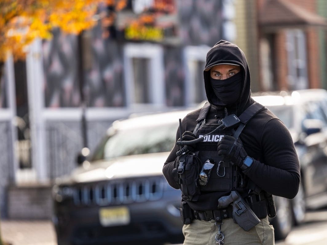 The Department of Justice argues that the new state law limiting when law enforcement can hide their identities improperly regulates federal officials.