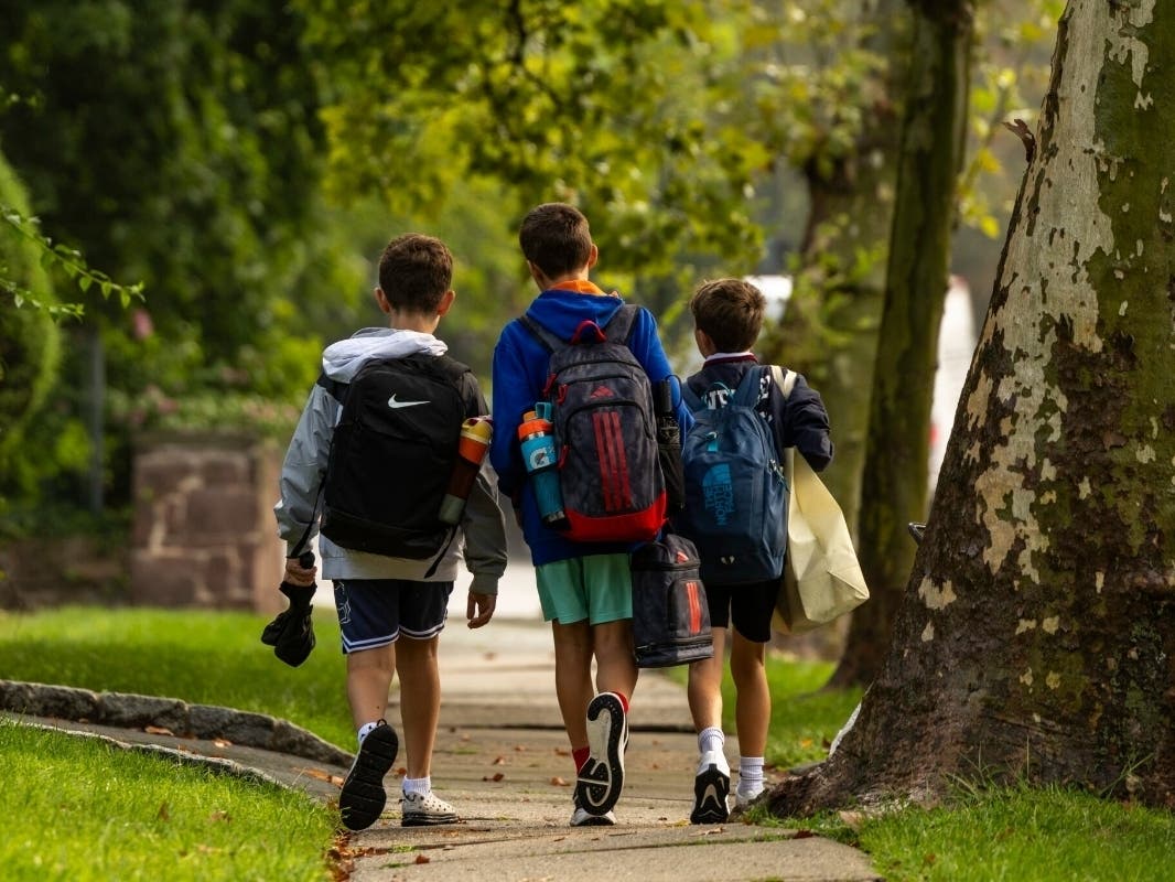 Students walk along Park Avenue on their way to school in Glen Ridge on Sept. 1, 2026.