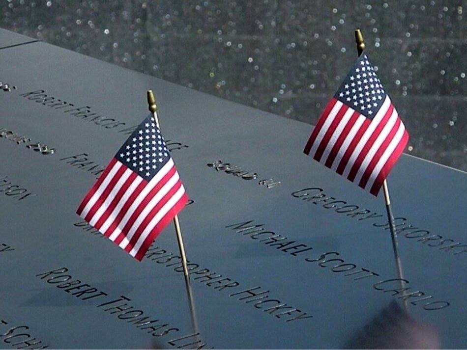 Flags placed in the names of the ones who perished in the Twin Towers during 9/11 in New York City. 