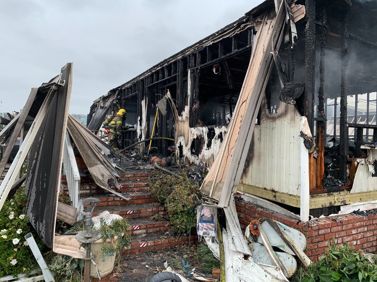 A mobile home was badly damaged Tuesday afternoon in a fire that sent one man to the hospital with severe burns.