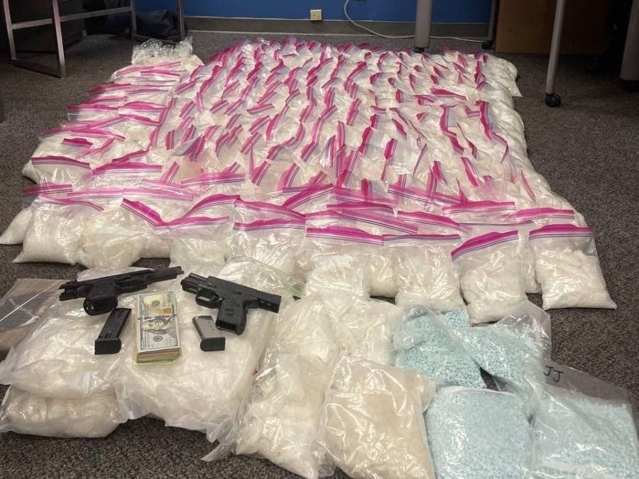 Police officers recovered 317 pounds of methamphetamine, 17 kilos of cocaine and fentanyl and two handguns. 