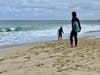 Skimboarders enjoy the un-crowded shores of Thousand Steps Beach in South Laguna.