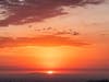 Orange County resident photographer Scott Plummer captured these vibrant photographs of the sun setting behind the Rancho Palos Verdes Peninsula, looking west from Orange County. 