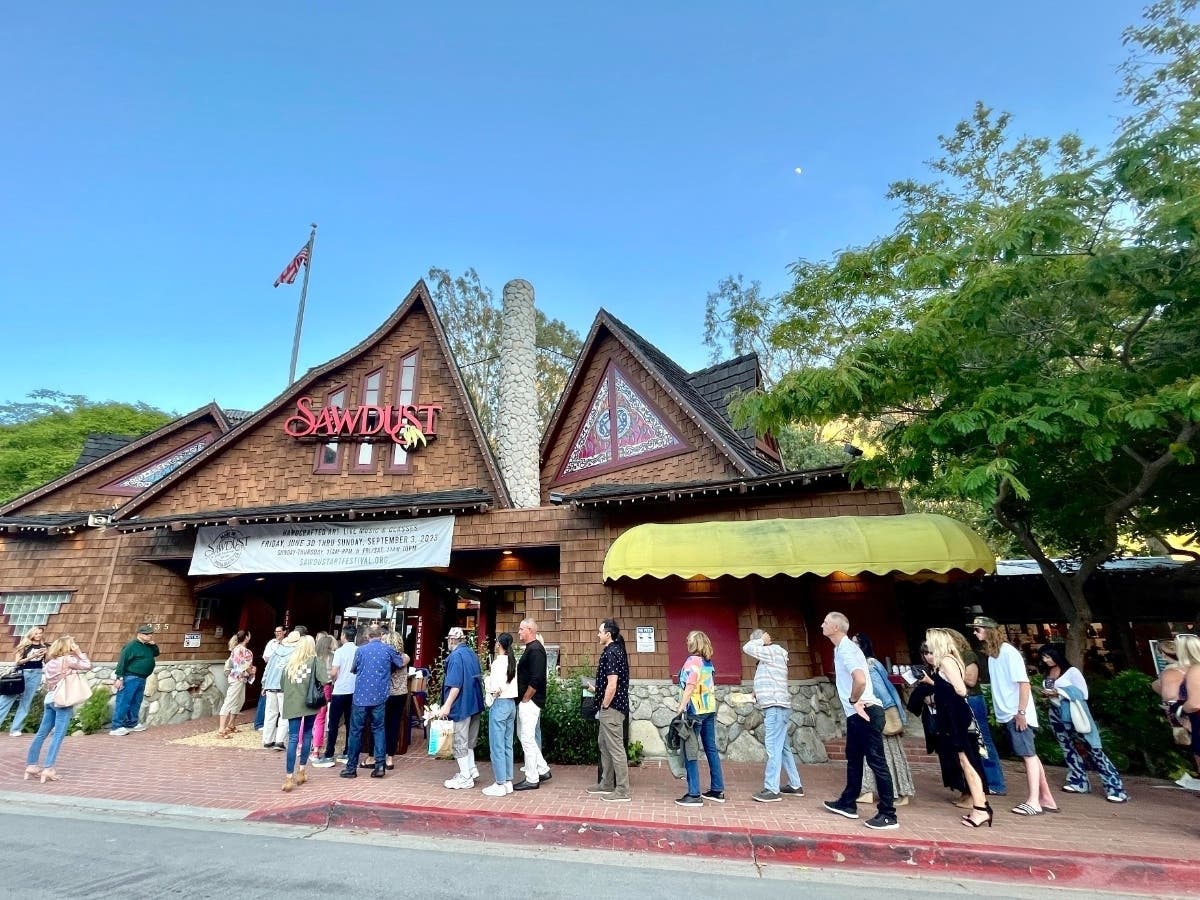 The lines were long for Sawdust Art Festival's annual preview night on Tuesday.