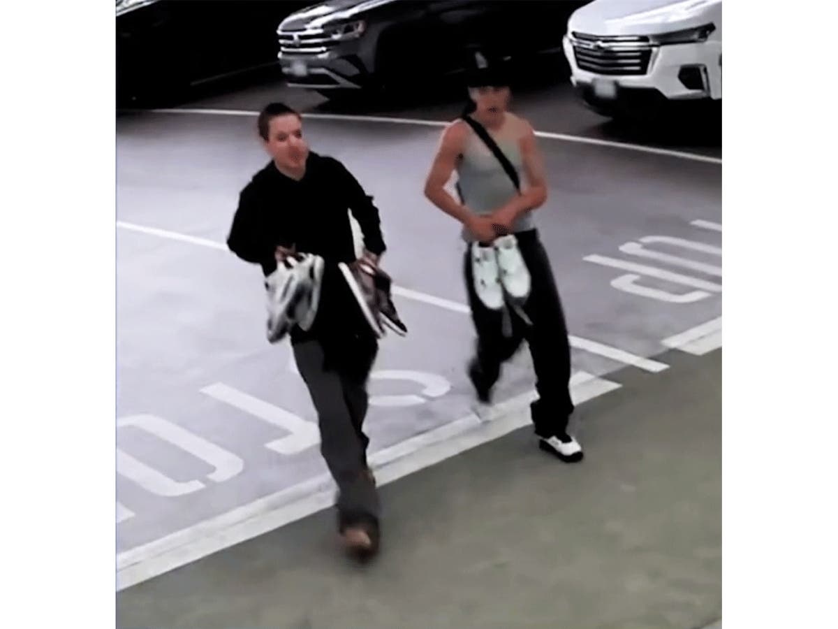 Authorities sought the public's help Wednesday in finding two suspects who used a handgun to rob four minors in an Irvine Spectrum Center bathroom earlier this week.