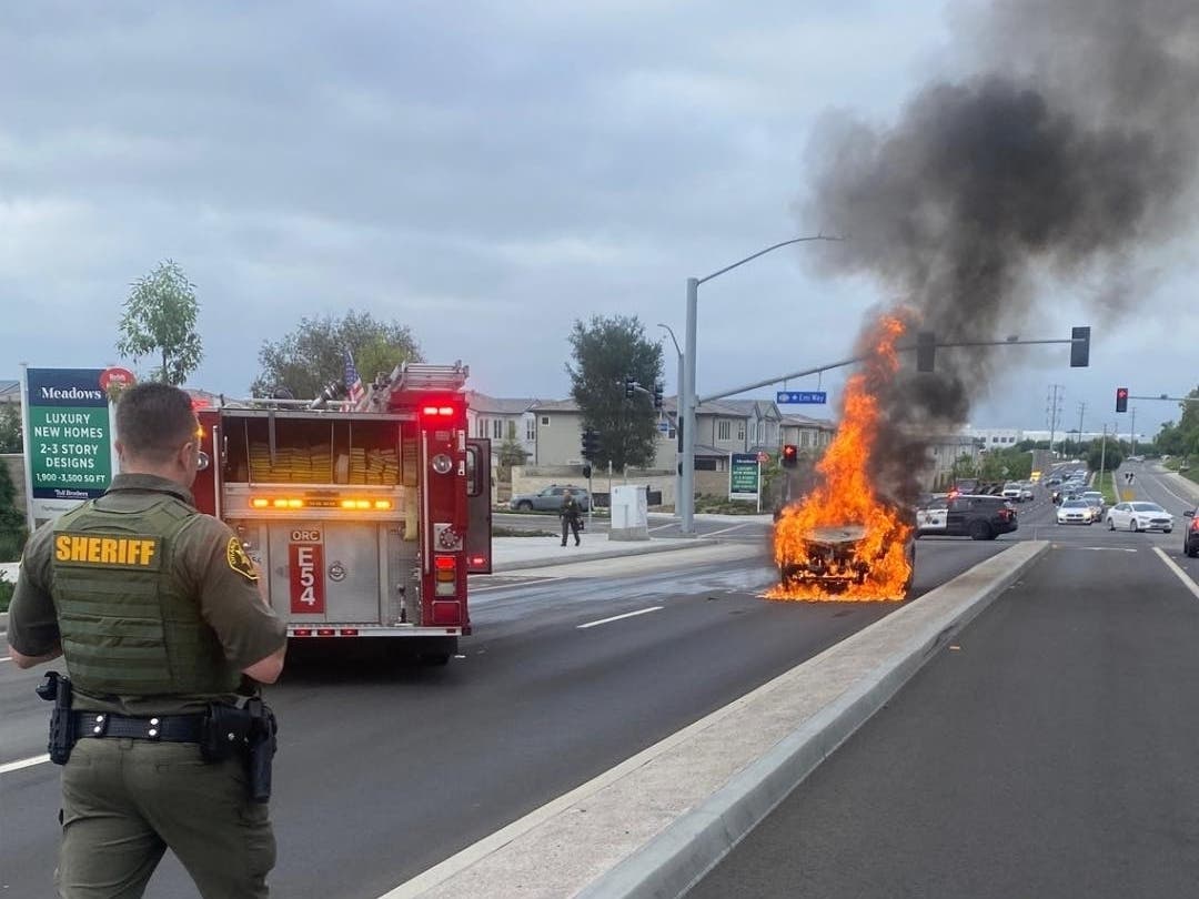 Orange County firefighters quelled a raging car fire that erupted in Lake Forest Wednesday morning, authorities said. 