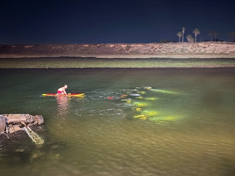 One person was rescued Tuesday night after their car drove into the wetlands off of Pacific Coast Highway in Orange County, authorities said. 