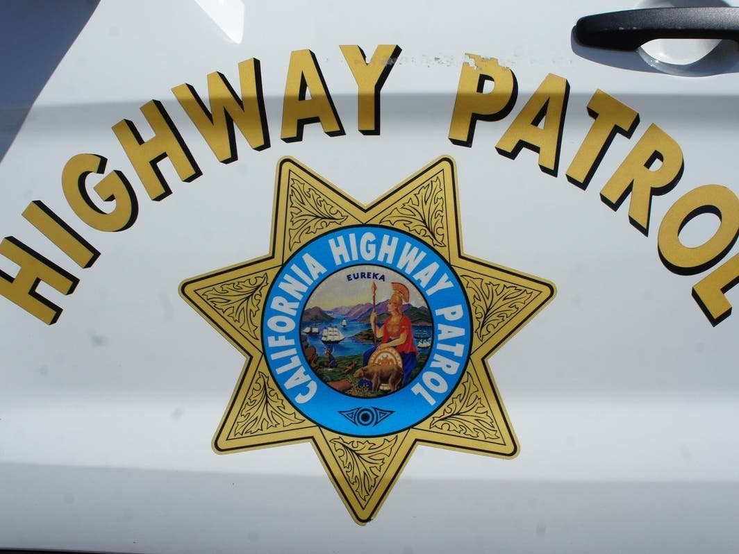At least one person died in a crash involving a dump truck on the 5 Freeway Monday in South Orange County, authorities said. 