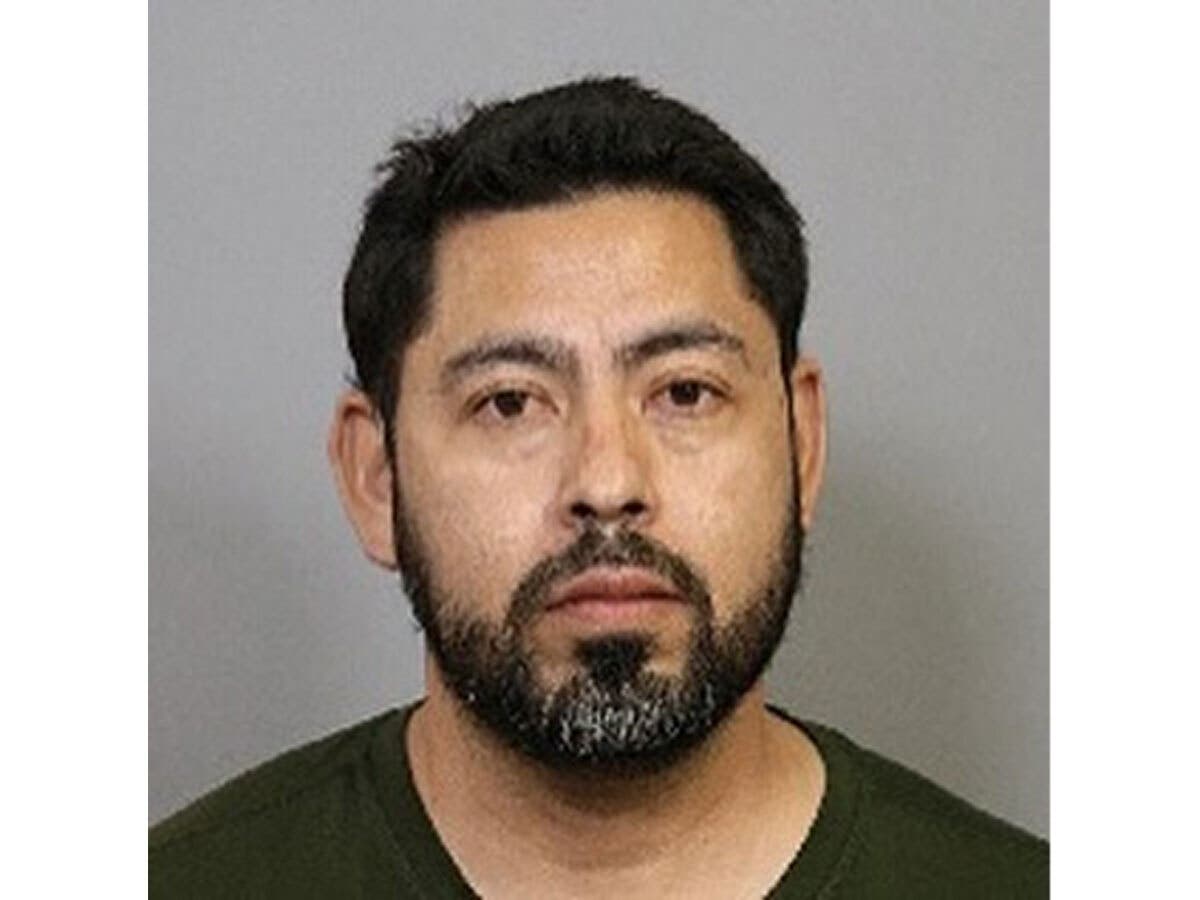 Flipe Ricoceballos, 43, is accused of attacking the victim on Feb. 27 in the 2100 block of Newport Boulevard in Costa Mesa, according to the Costa Mesa Police Department.