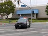 A Garden Grove Police vehicle stationed near the incident area.