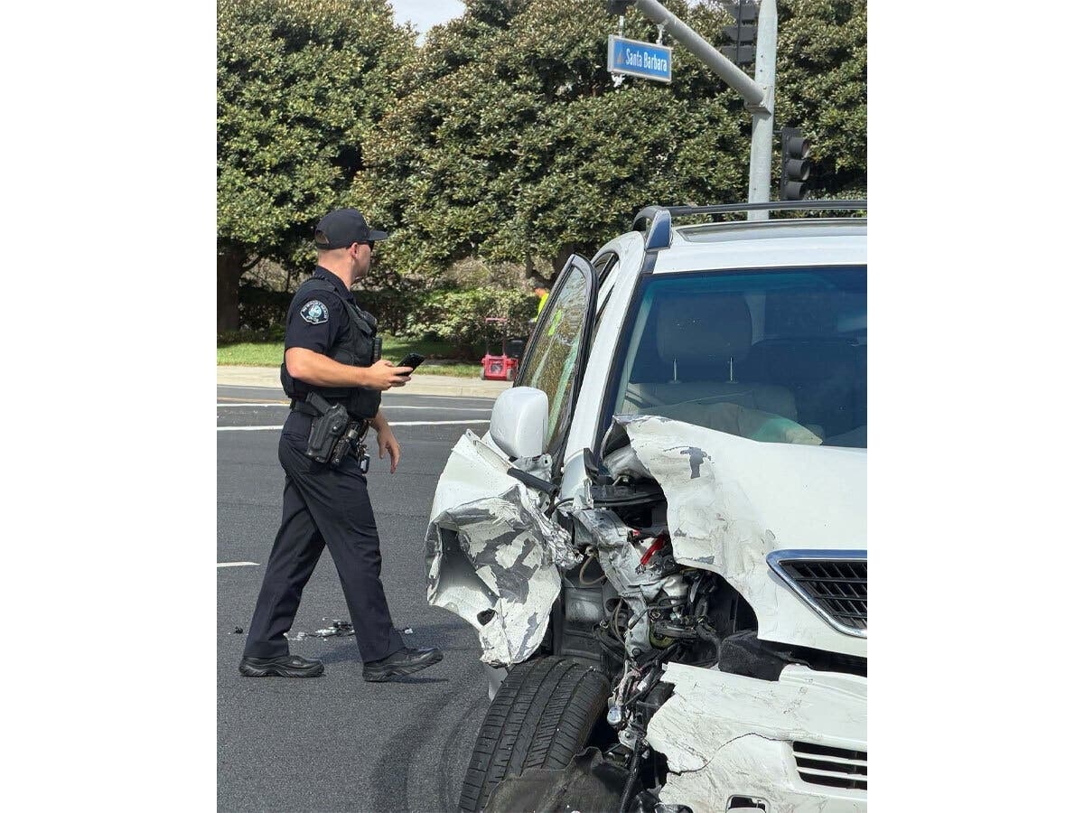The crash happened on Jamboree Road and Santa Barbara Drive at 9:49 a.m. and involved two cars, according to the Newport Beach Police Department.