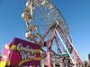 The Ferris wheel was just one of many carnival attractions, including games and famous carnival snacks like funnel cakes and corndogs. 