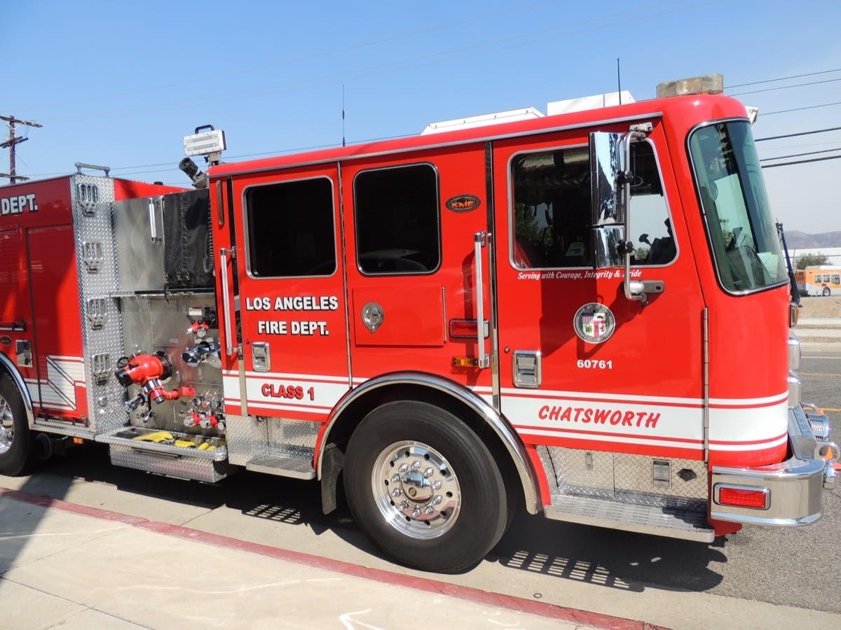The Los Angeles Fire Department rescued a teenage boy from a mountain in Chatsworth Friday. 