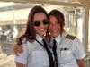 BRINGING JOY TO THE SKIES...Captain Suzy Garrett and her first-officer daughter, Donna.