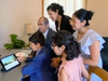 The Azpeitia family of Chicago uses the resources found at
jw.org for a preview of the “Pursue Peace” convention.