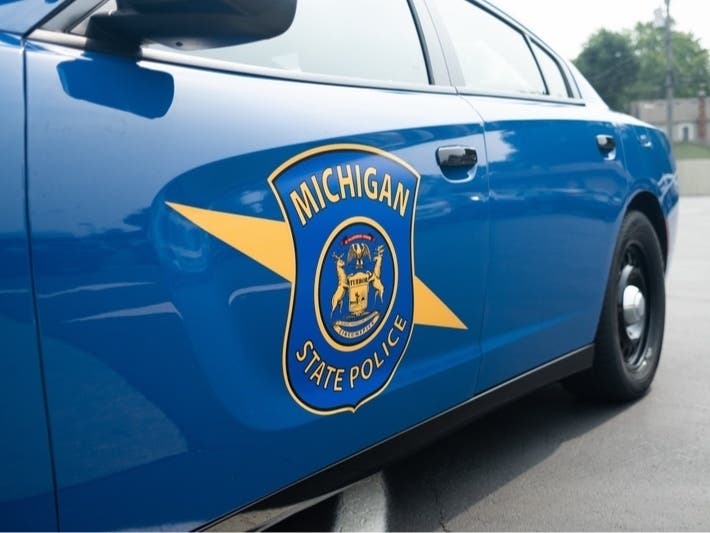 Michigan State Police said the woman faces multiple charges including robbery, operating while intoxicated, carjacking and child endangerment.