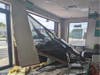 A car smashed through the front window of a Subway restaurant in Ann Arbor on Monday afternoon​, according to police.