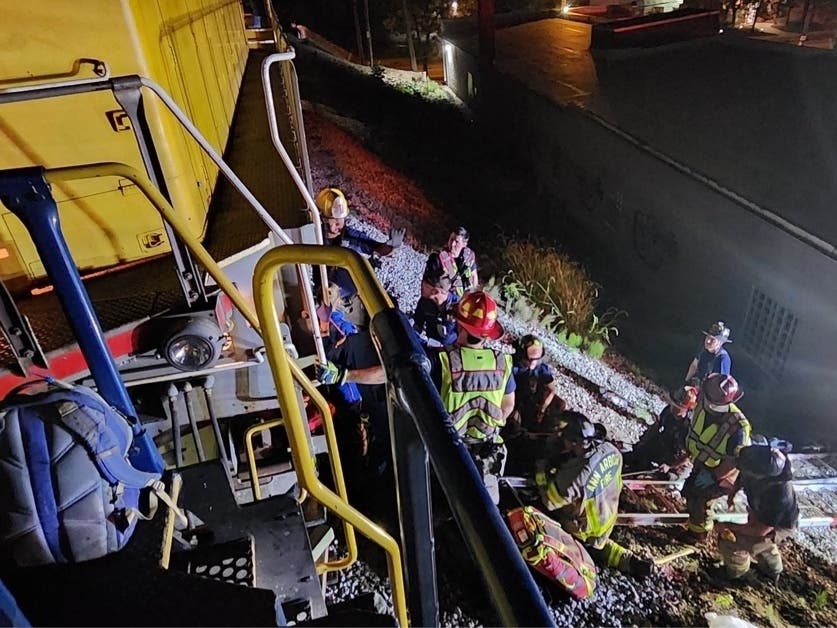 A man is recovering after he was run over by a train Monday night in Ann Arbor, according to fire officials.