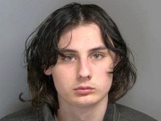 Joel Edwards, 20, was charged with making an intentional threat to commit violence against a school, using a computer to commit a crime and felony firearm.
