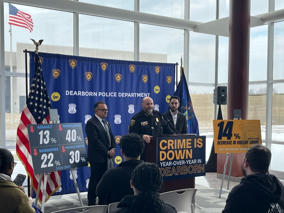Dearborn Police Chief Issa Shahin addresses a press conference to announce yearly decline in violent crime and serious criminal incidents in the city, alongside Mayor Abdullah H. Hammoud and Council President Michael T. Sareini.