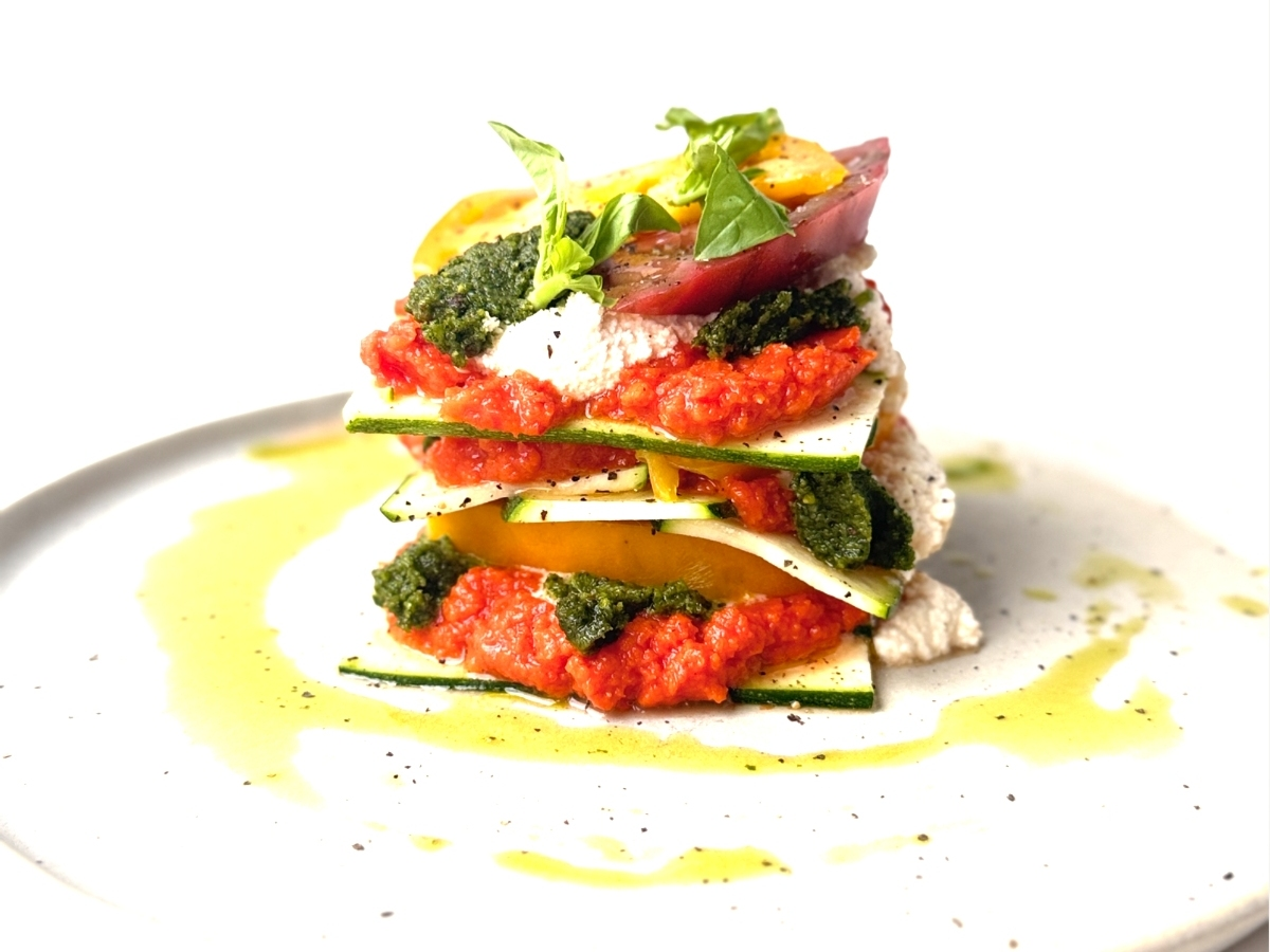 The f﻿lavorful menu will offer Chef Matthew Kenney’s signature dishes, such as Heirloom Tomato Lasagna. 