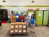Meals purchased and packed by Rotarians from Enfield were donated  to the Pantry at CT State Asnuntuck. Presenting the donation to Pantry Coordinator Deanna Theodore are Rotarians Aimee Nieroda, Joe Muller, Sally DeJesus and Kim Quinn. 