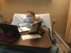 Sharon Southerland writing encouraging letters to friends and neighbors from her nursing home bed
