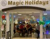 The Feyereisens cutting the ribbon to officially open Magic Holidays. 
