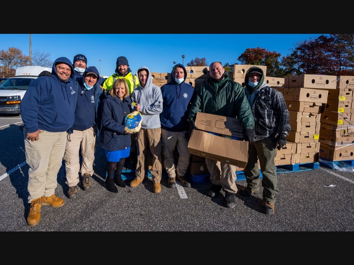 Supervisor Angie Carpenter and other local officials donated traditional Thanksgiving meals to families in WEST West Islip.